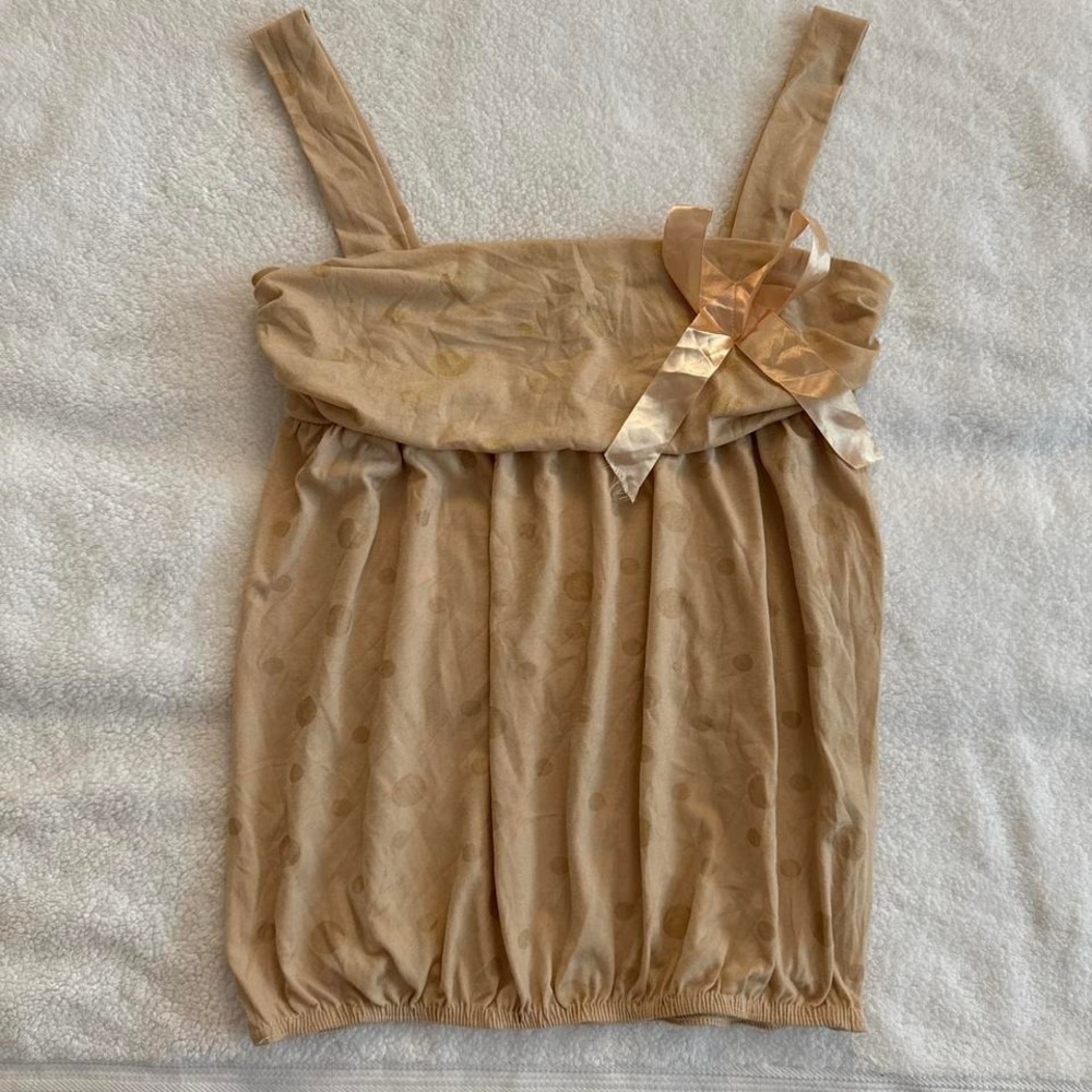 Gold and tan polka dot bubble top with bow detail